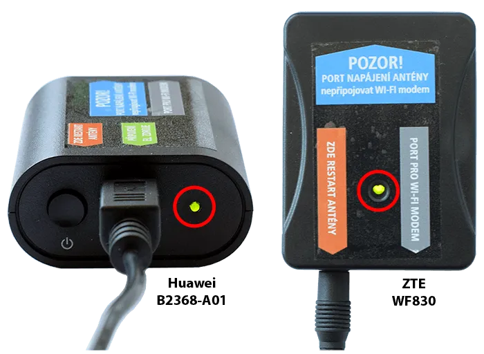 Rozsvícená kontrolka na černé venkovní anténě